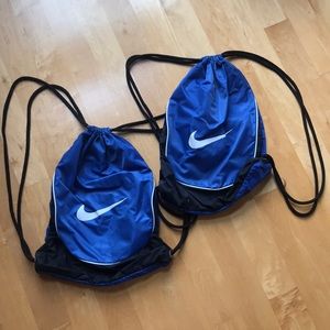 Nike Bags - DOUBLE PACKAGE Nike drawstring backpacks Nike Bags - DOUBLE PACKAGE Nike drawstring backpacks